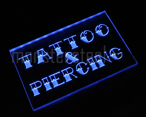 The Entrance is on the side of the Building under the neon Tattoo sign i296-b NEW Tattoo & Piercing Shop Logo Neon Light Sign. Please wait