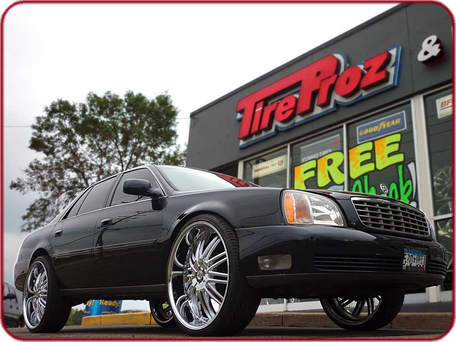 2002 Cadillac Deville on 26 inch Lexani LX-10 chrome rims